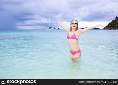 Young girl having fun in tropical water