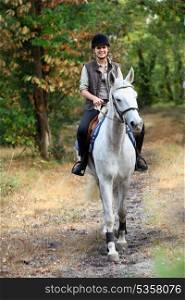 Young girl horseriding