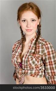 young girl in a checkered shirt