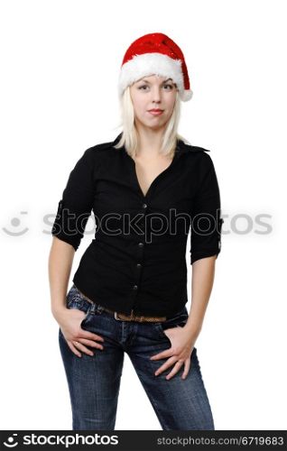 Young girl in a Santa Claus hat on the white background