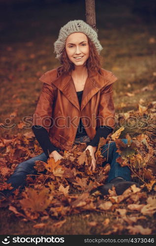 young girl in autumn park. girl in autumn park