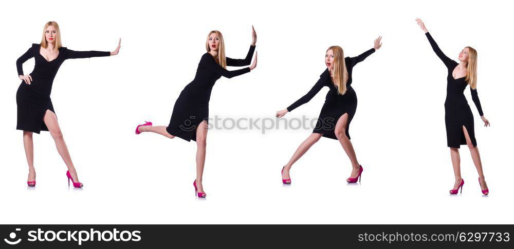 Young girl in black dress pushing isolated on white. Beautiful blond in elegant black dress isolated on white