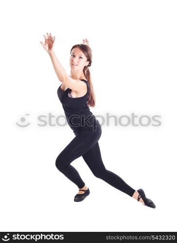 Young girl in black shows dance, fitness, exercise