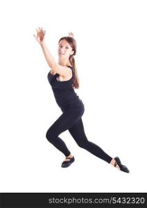 Young girl in black shows dance, fitness, exercise