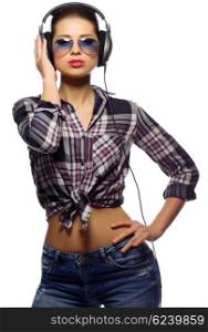 Young girl in blue jeans listen music isolated