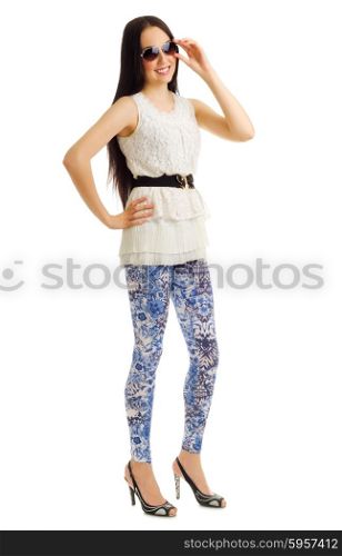 Young girl in blue pants with sunglasses isolated
