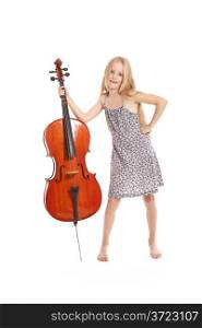 young girl in dress and her cello standing in studio against white background