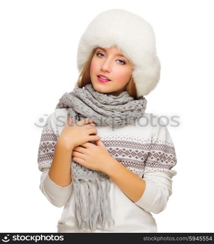 Young girl in fur hat isolated