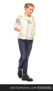 Young girl in jeans and sweater isolated