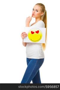 Young girl in jeans with love card isolated