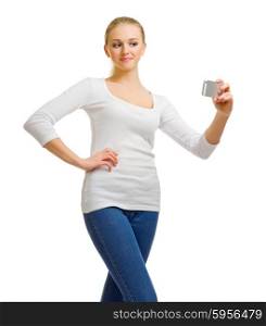Young girl in jeans with mobile phone isolated