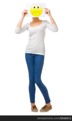 Young girl in jeans with sad poster isolated