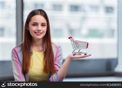 Young girl in online shopping concept