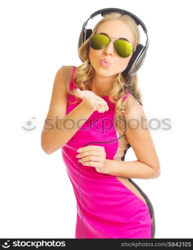 Young girl in red dress with headphones isolated