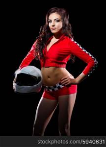 Young girl in red racing costume isolated