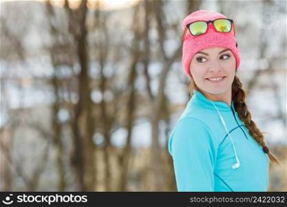 Young girl in winter park. Staying beautiful and healthy. Beauty health fitness nature concept. . Young girl in winter park