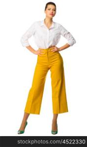 Young girl in yellow pants isolated