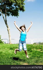 Young girl jumping high