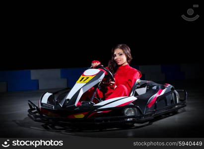 Young girl karting racer isolated