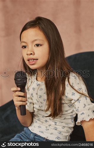 young girl learning how sing home 3