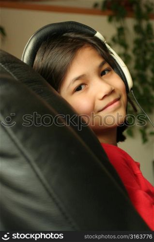 Young girl listening to music