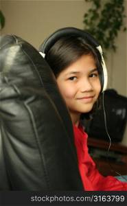 Young girl listening to music