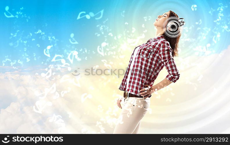 Young girl listens to music