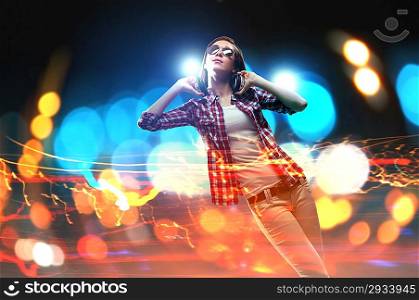 Young girl listens to music