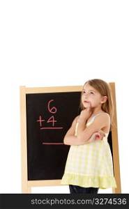 Young Girl Looking Thoughtful Next To Blackboard