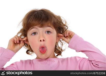 Young girl making a funny face