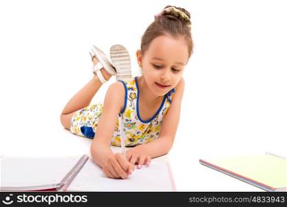 Young girl making some draws - isolated over white