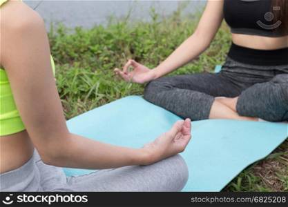 young girl meditates while practicing yoga. freedom, calmness and relax concept, woman happiness