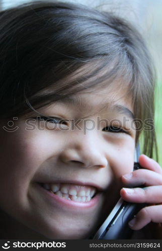 Young girl on a mobile phone