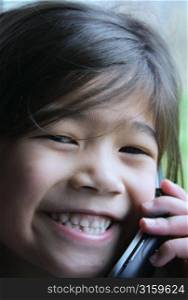 Young girl on a mobile phone
