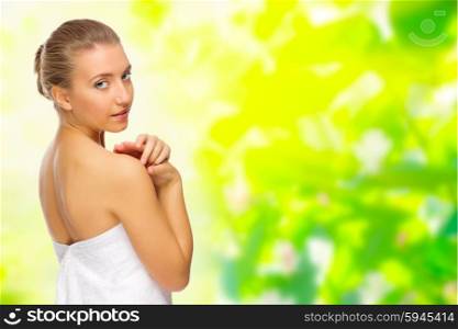 Young girl on floral spring background