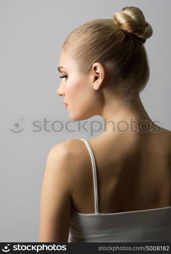 Young girl on grey background