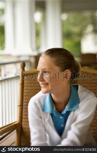 Young Girl on Porch Smiling