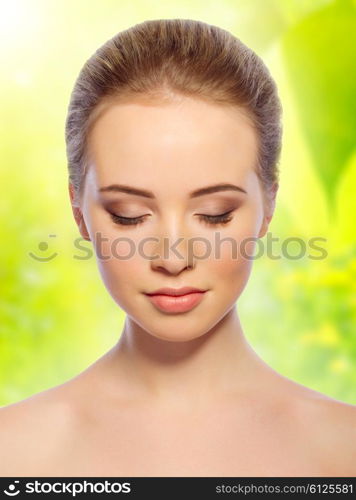 Young girl on spring floral background