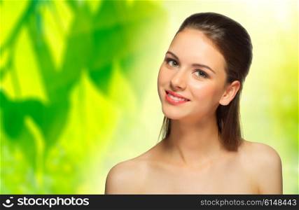 Young girl on spring floral background
