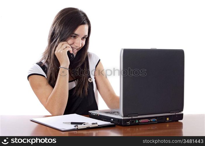 Young girl on the phone with laptop