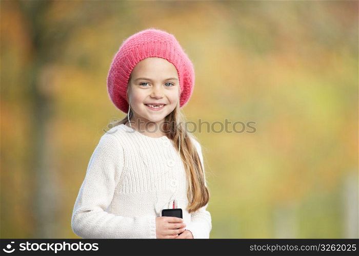 Young Girl Outdoors With MP3 Player