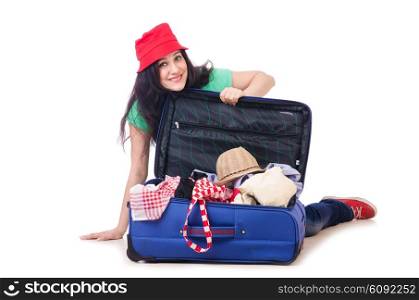 Young girl packing for vacation