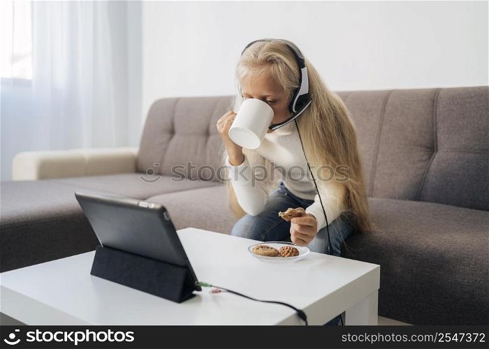 young girl paying attention online class 2