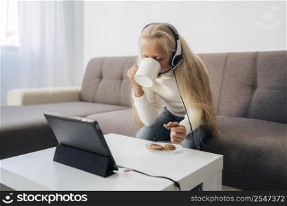 young girl paying attention online class 2