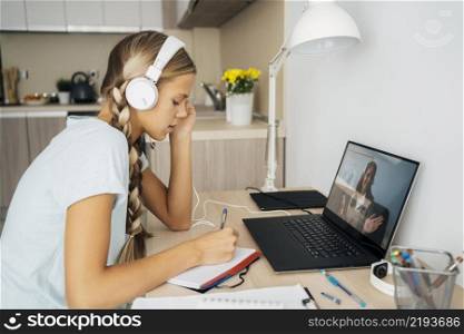 young girl paying attention online class 3. young girl paying attention online class 2