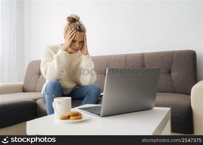 young girl paying attention online class 5
