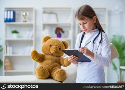 Young girl playing doctor in early development concept