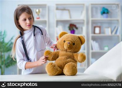 Young girl playing doctor in early development concept