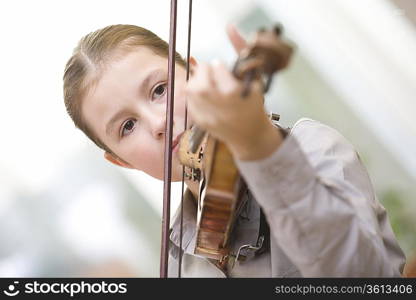 Young girl playing violin