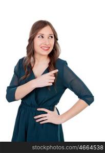 Young girl pointing with the finger isolated on a white background
